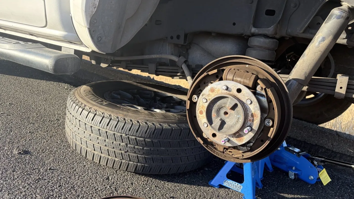 Brake rotor and caliper exposed with the wheel off