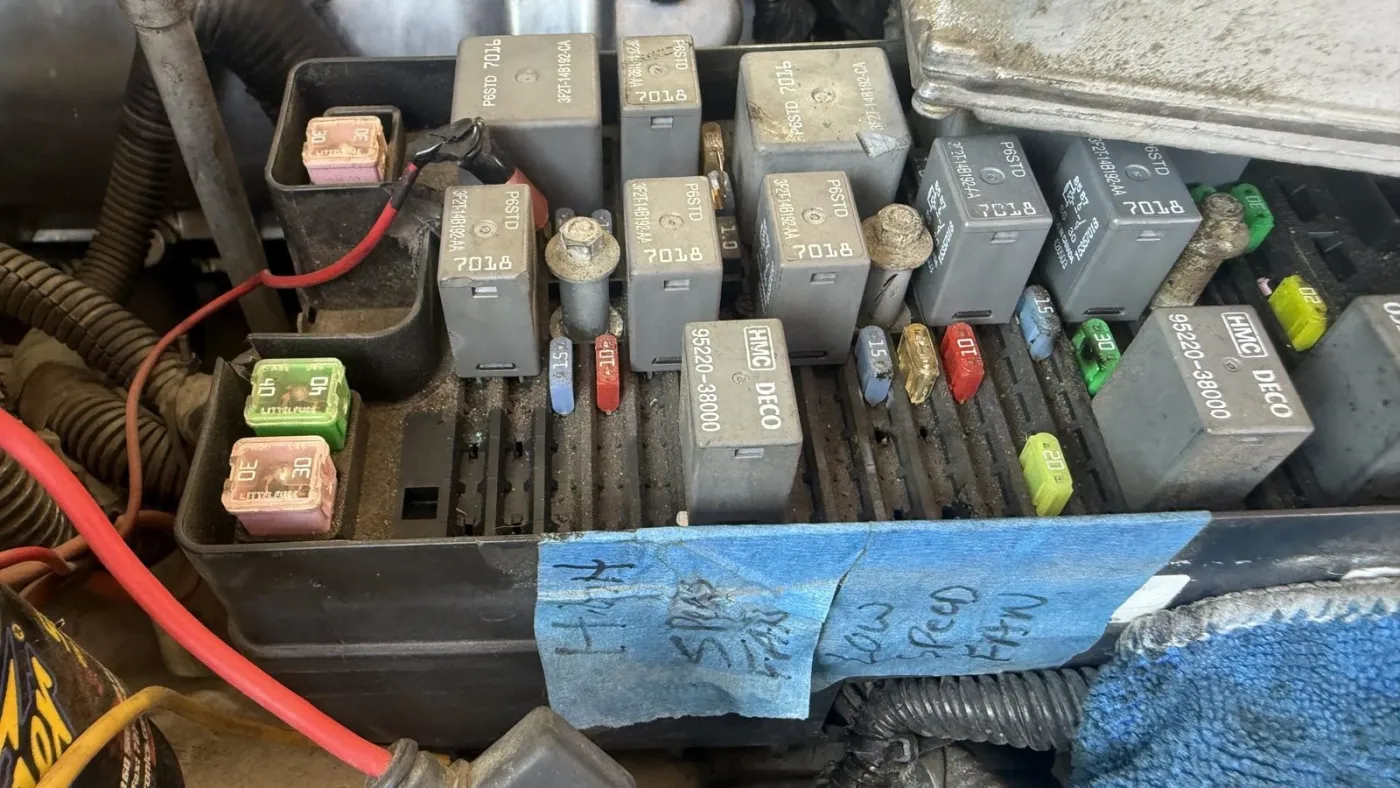 Fuse and relay box under the hood with wiring