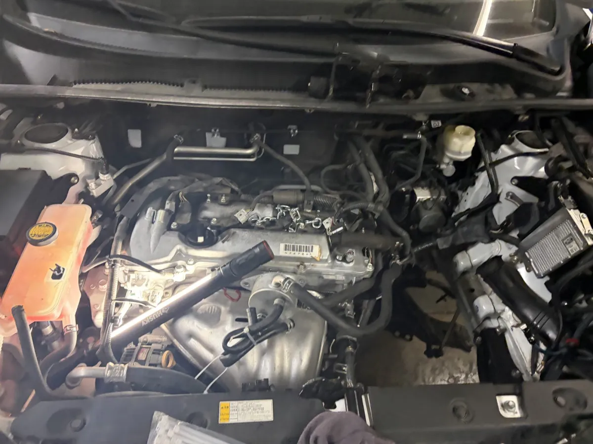 Clean engine bay with the battery in view